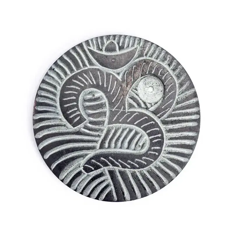 Stojan na vonné tyčinky a kužely Óm z přírodního kamene.